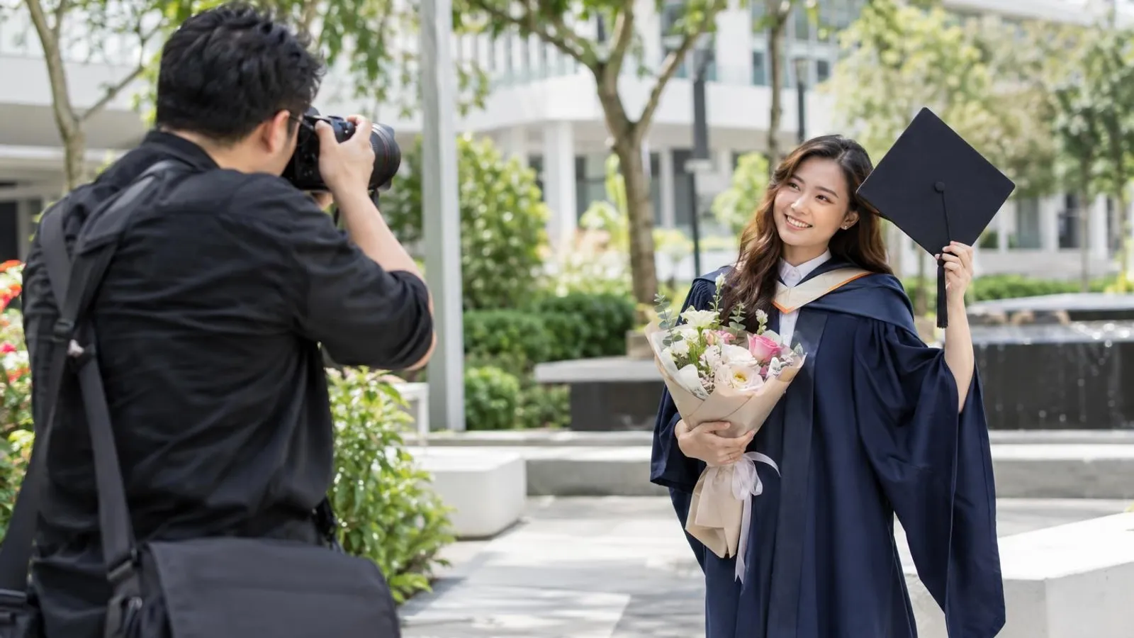 Graduation Photographers: a customer and a provider in a bright, modern setting