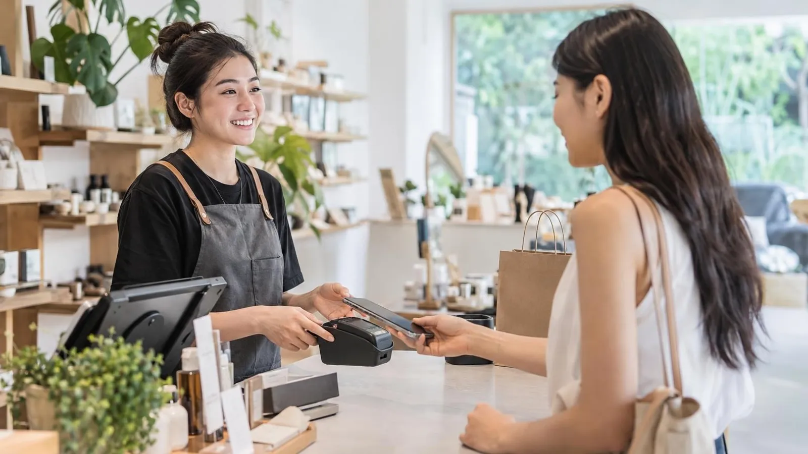 Loyalty Programme Platforms: a customer and a provider in a bright, modern setting