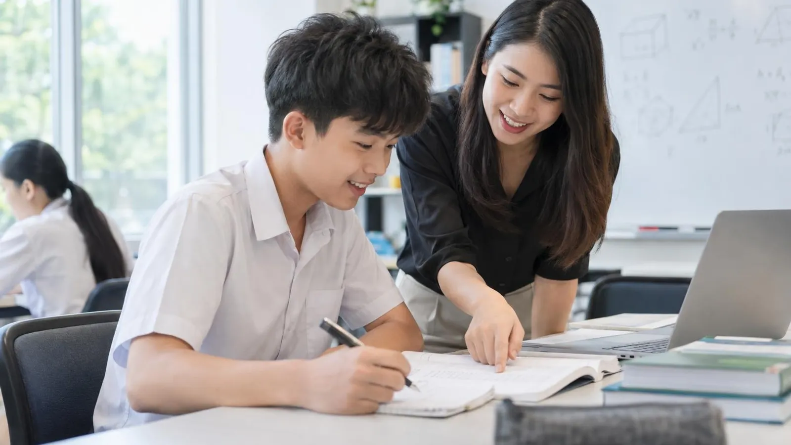 Secondary School Tuition Centres: a customer and a provider in a bright, modern setting