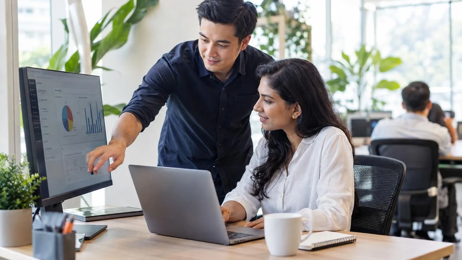 Zoho Partners: a customer and a provider in a bright, modern setting